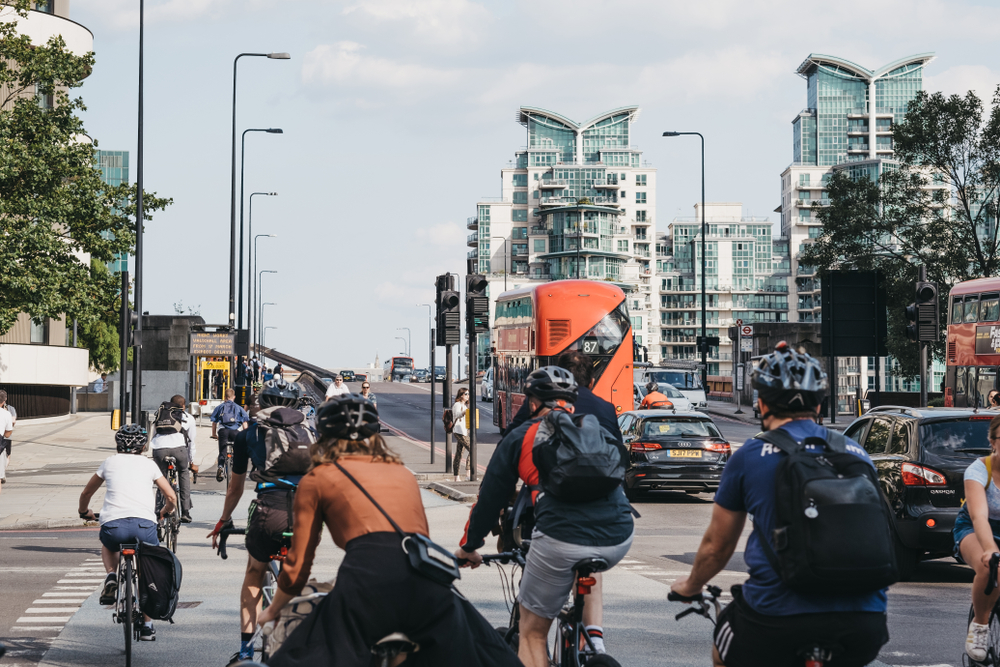 commuters cycling in London. Discover why electric mountain bikes are ideal for UK commuting. Explore the comfort, cost savings and versatility of eMTBs for everyday travel.